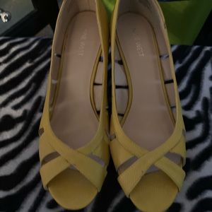 Yellow Nine West peep toe wedge sandal
